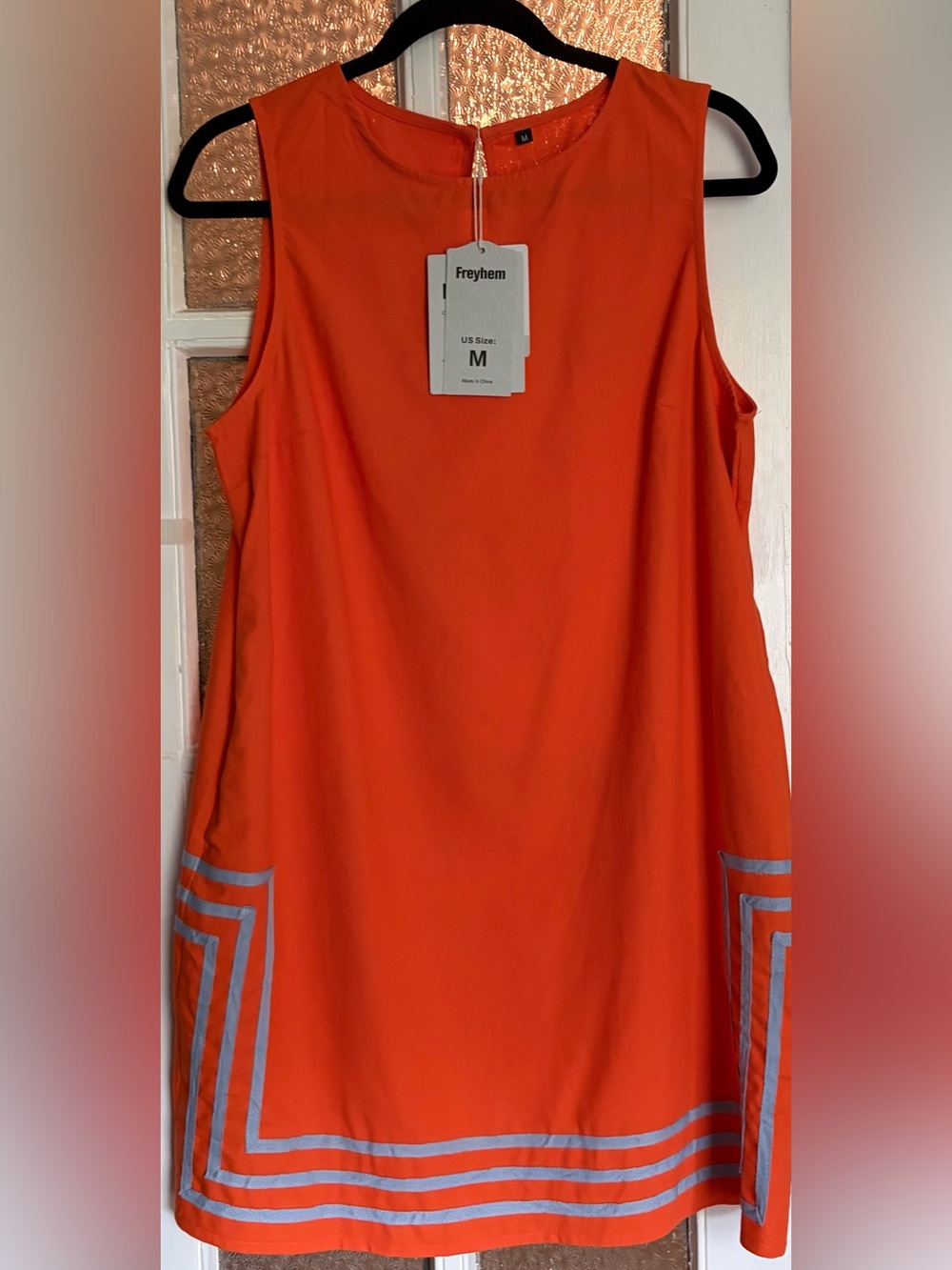 Women’s orange a-line dress. New. Size Medium. Linen blend. Sleeveless w/pockets
